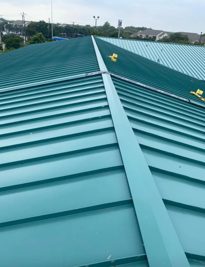 Green commercial metal roof ridge and valley for Metal Roof Repair in Lake Morton-Berrydale